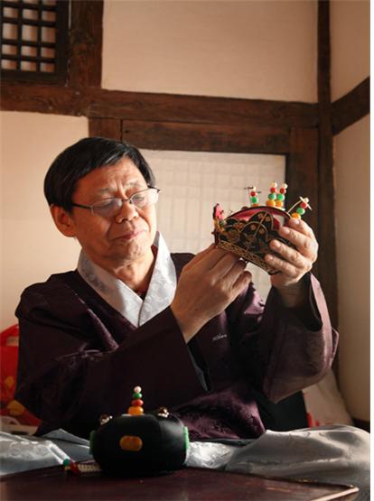 관모장